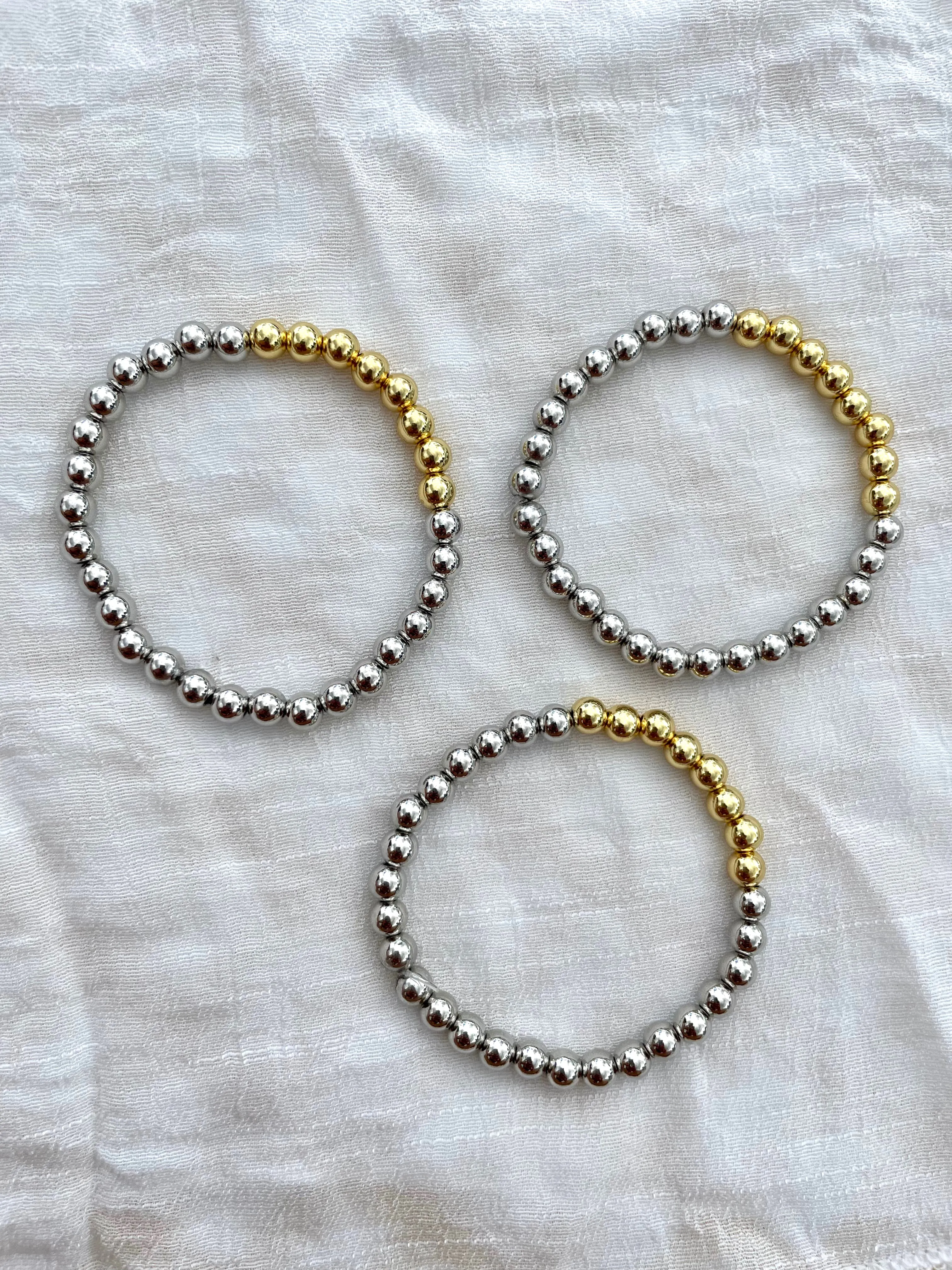 Bicolor gold beaded bracelets