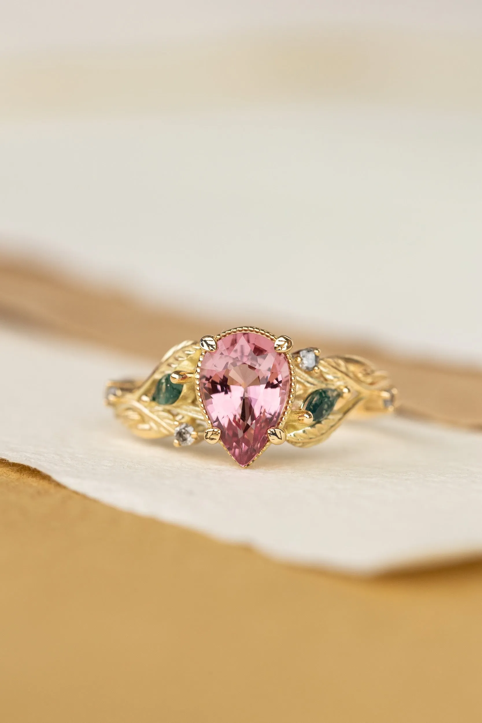 Pink spinel nature themed engagement ring with moss agates and salt and pepper diamonds / Patricia