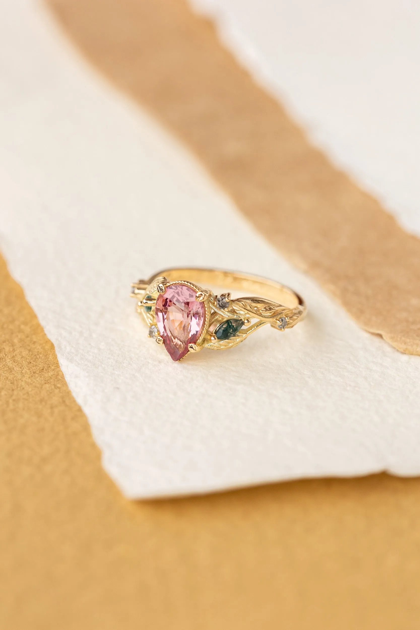 Pink spinel nature themed engagement ring with moss agates and salt and pepper diamonds / Patricia