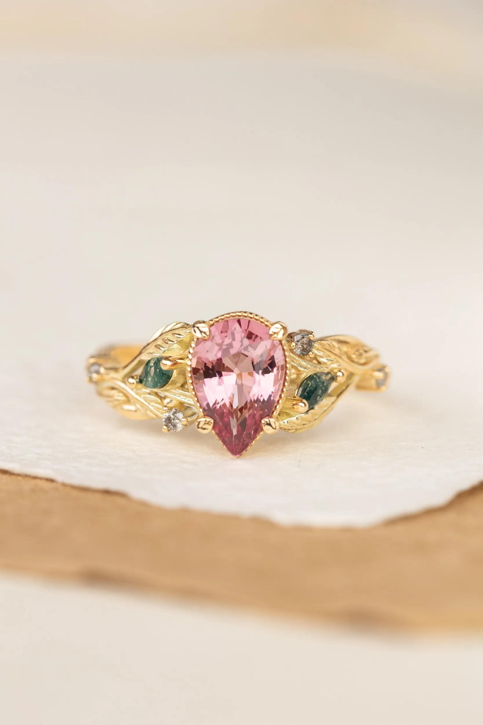 Pink spinel nature themed engagement ring with moss agates and salt and pepper diamonds / Patricia