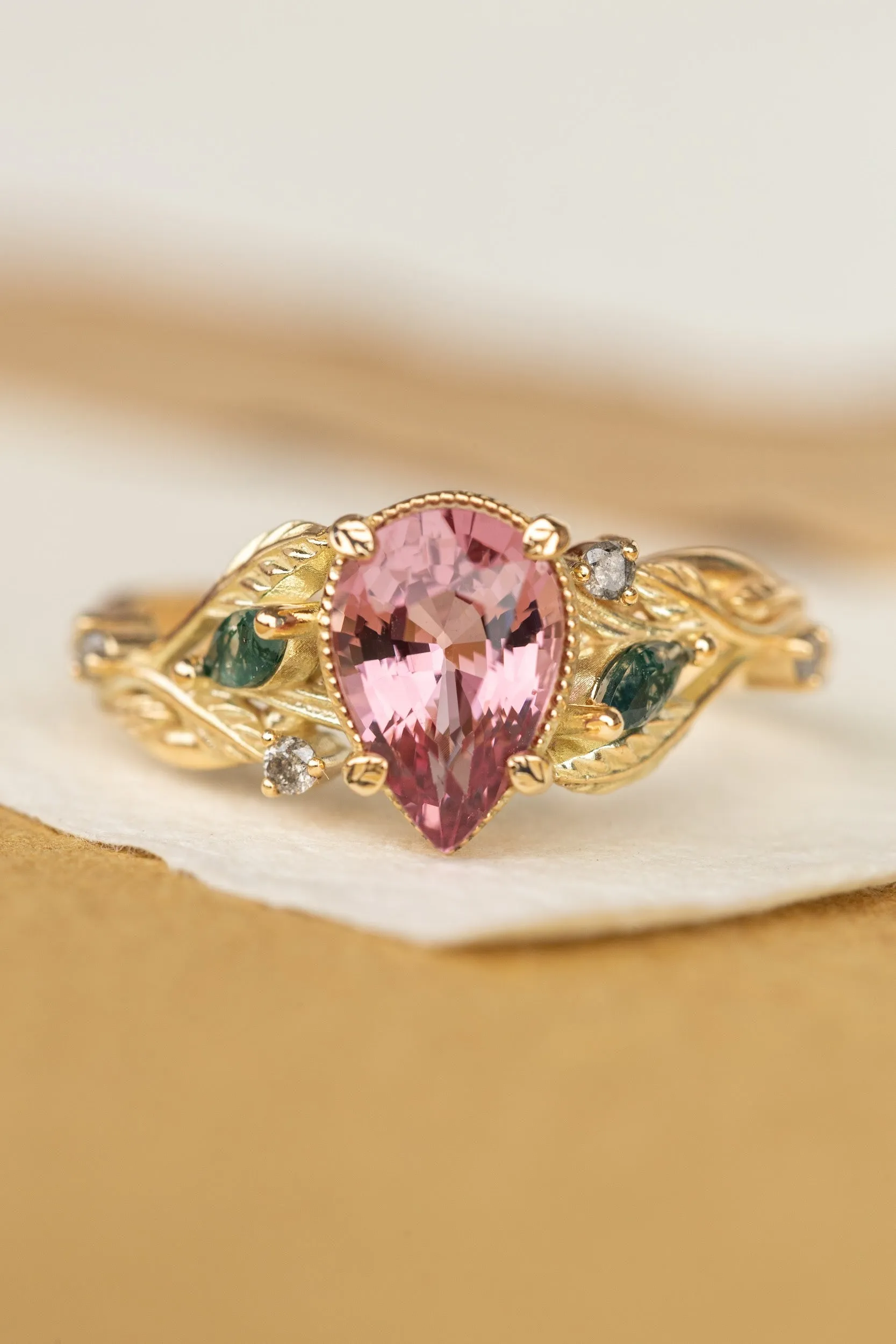 Pink spinel nature themed engagement ring with moss agates and salt and pepper diamonds / Patricia