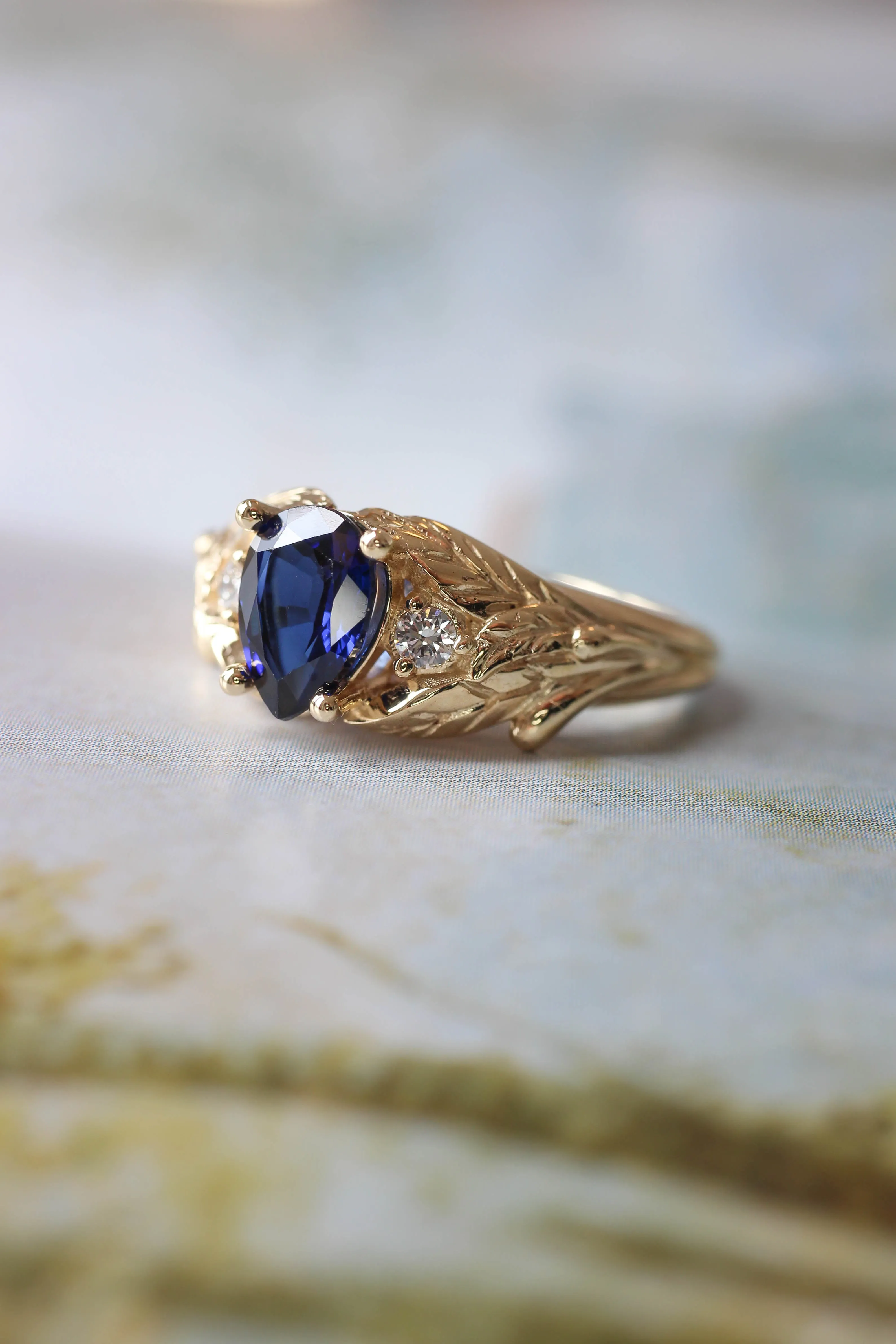 Wisteria | pear cut gemstone setting with accent diamonds